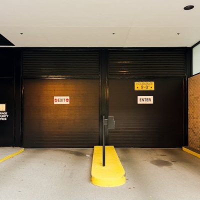 Dark brown garage doors installed and working